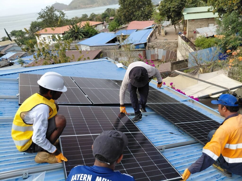 GoKoval team installing the panels