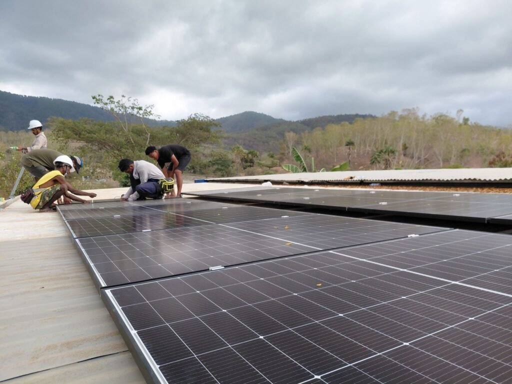 Rooftop solar array being installed by GoKoval